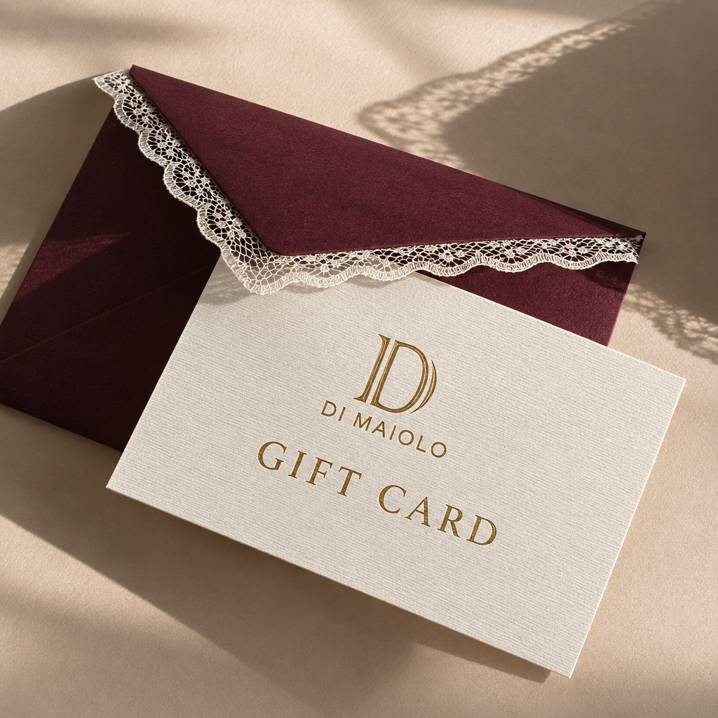 Proposta gift card Di Maiolo con carta materica, busta e pizzo